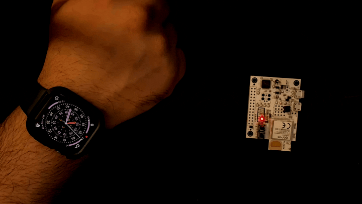 An Apple Watch home key unlocking the DWM3001CDK on approach